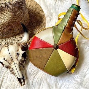 v i n t a g e :: Beautiful Boho Leather Patchwork Wrapped Glass Bottle